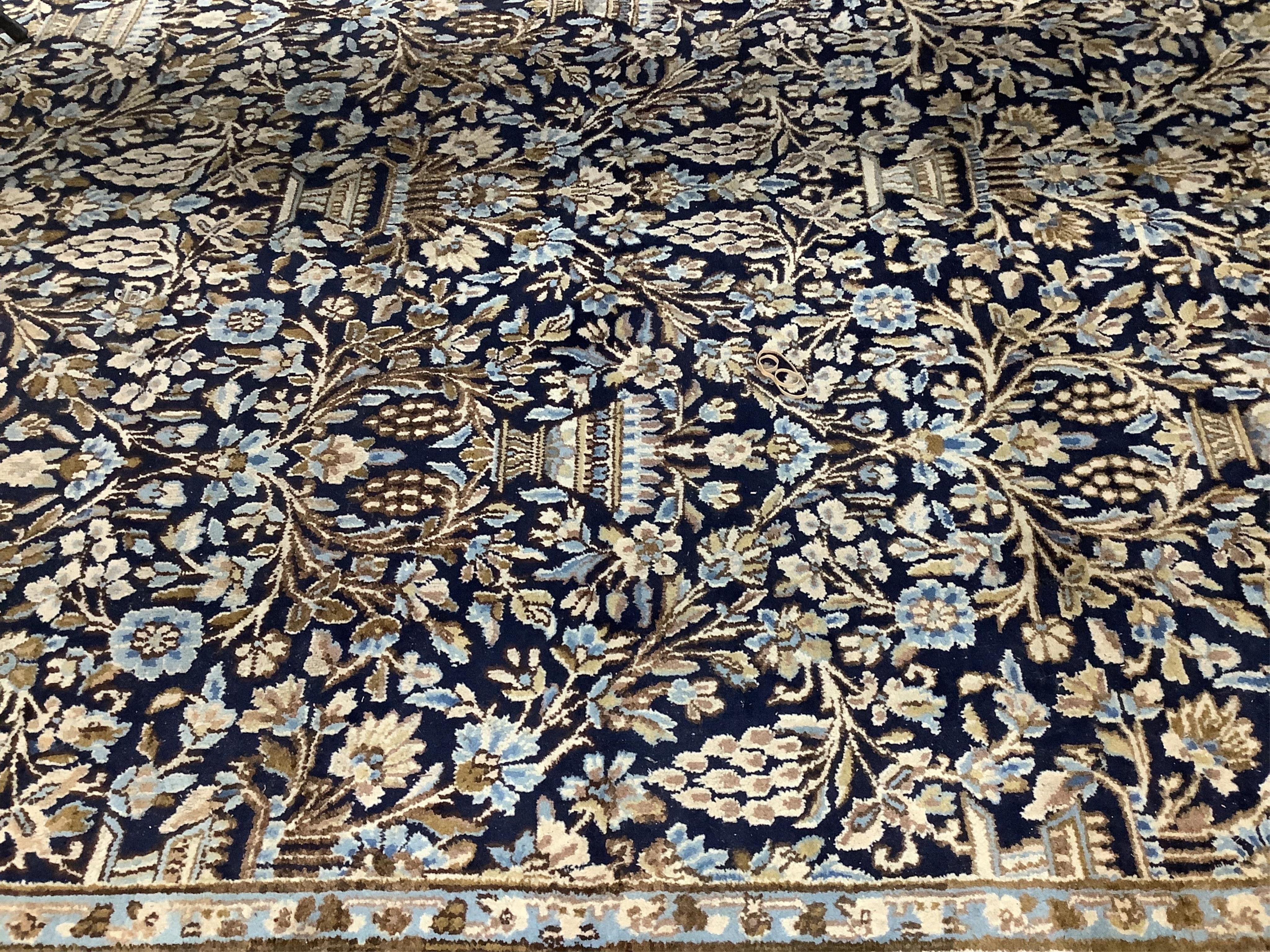 A North West Persian blue ground carpet, 394 x 284cm. Condition - good